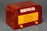 DeWald A-502 ’Step-Top” in Oxblood + Yellow Insert Grille Catalin Radio